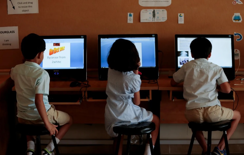 La tecnologia digital a l'escola, un benefici real?